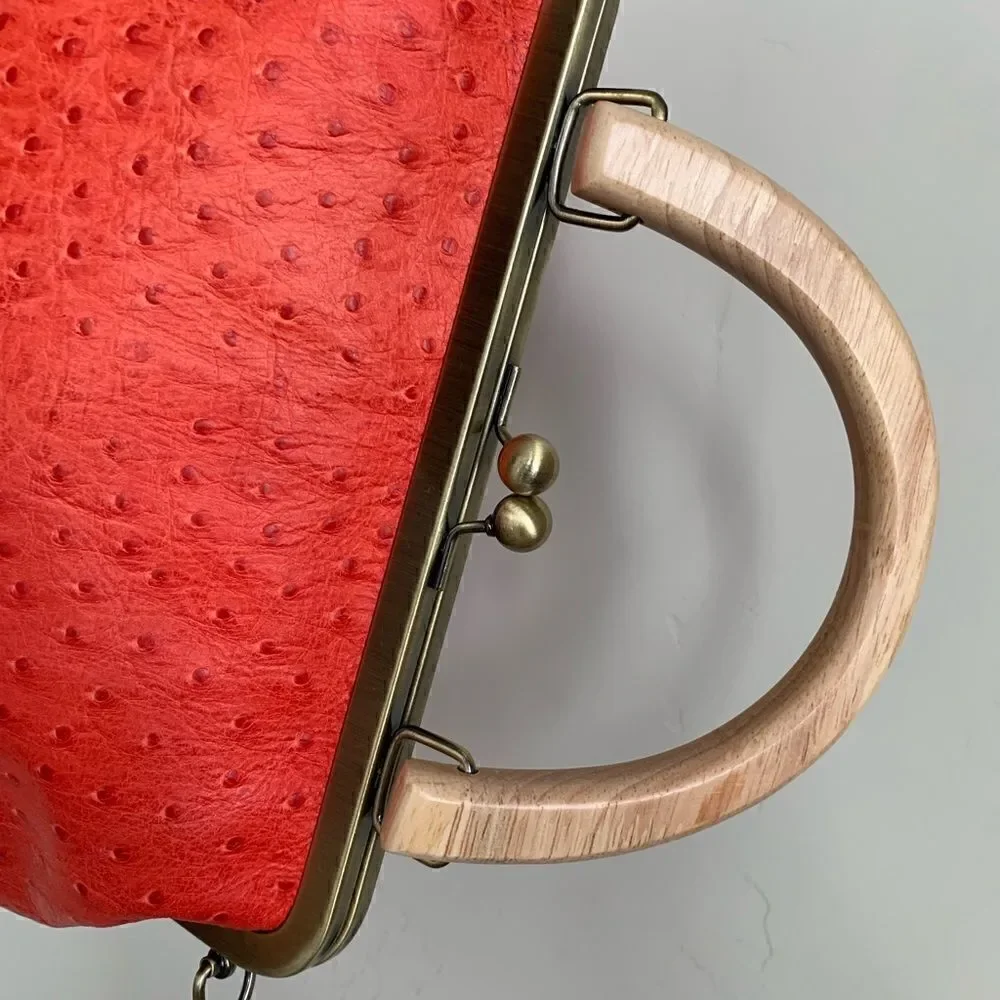 Handmade Genuine Ostrich Textured Cowhide, Wood Handle Kisslock Metal Frame Bag